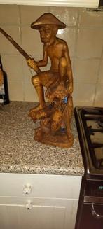 een uit hout gesneden beeld denk balie of Indonesië, Ophalen