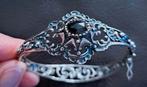 Zilveren antieke armband ingelegd met granaatsteen, Ophalen