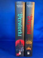 Marissa Meyer - Verguld 1 en 2 (ZGAN), Ophalen of Verzenden, Zo goed als nieuw, Marissa Meyer