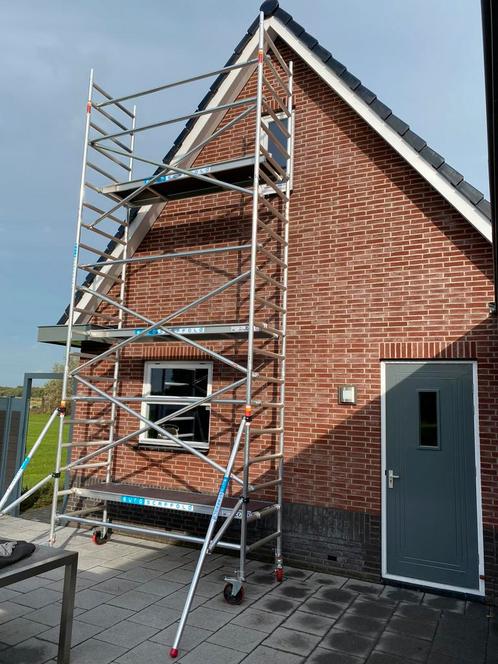 Te Huur Rol Steiger, Doe-het-zelf en Verbouw, Steigers, Zo goed als nieuw, Rolsteiger of Kamersteiger, 5 meter of hoger, Ophalen of Verzenden