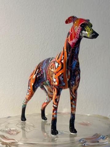 fleurig windhond whippet greyhound beeld  beschikbaar voor biedingen