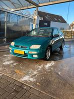 Mazda 323 1.5 I Coupe LX AUT 1996 Groen, Auto's, Mazda, Automaat, 1489 cc, 4 cilinders, 400 kg