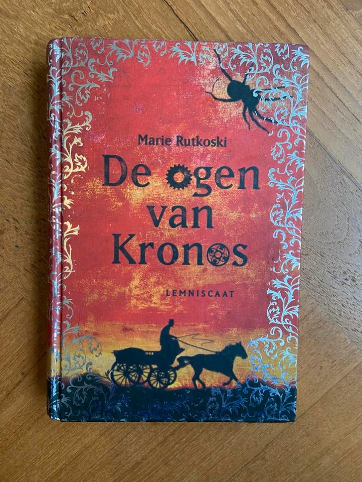 De ogen van Kronos - Marie Rutkoski, Boeken, Romans, Zo goed als nieuw, Nederland, Ophalen of Verzenden