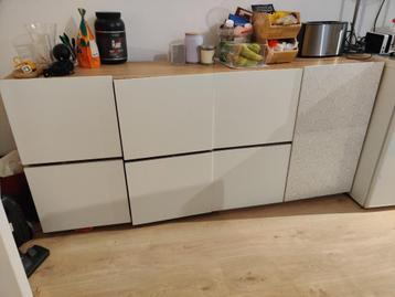 Console. White cupboard with lights