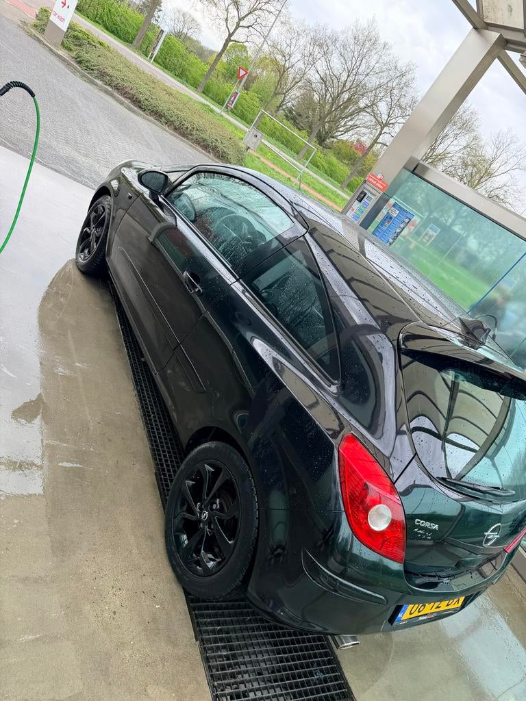 Opel Corsa 1.2 16V 3D WR 2007 Zwart, Auto's, Opel, Voorwielaandrijving, 450 kg, 40 €/maand, 4 cilinders