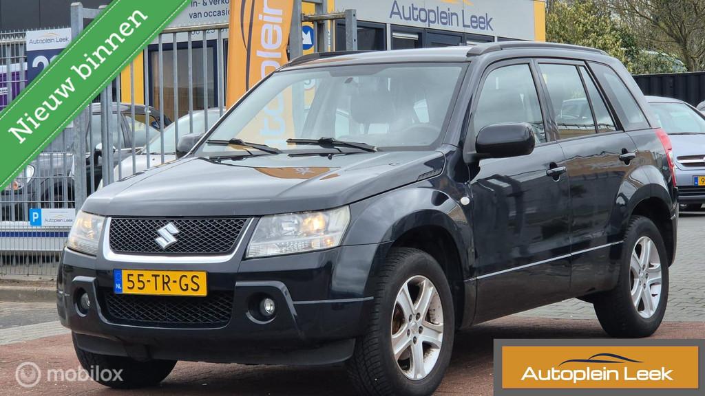 Suzuki Grand Vitara 2.0-16V High Executive 4X4 APK28-03-2027, Auto's, Suzuki, 4 cilinders, 1850 kg, Grand Vitara, Zwart