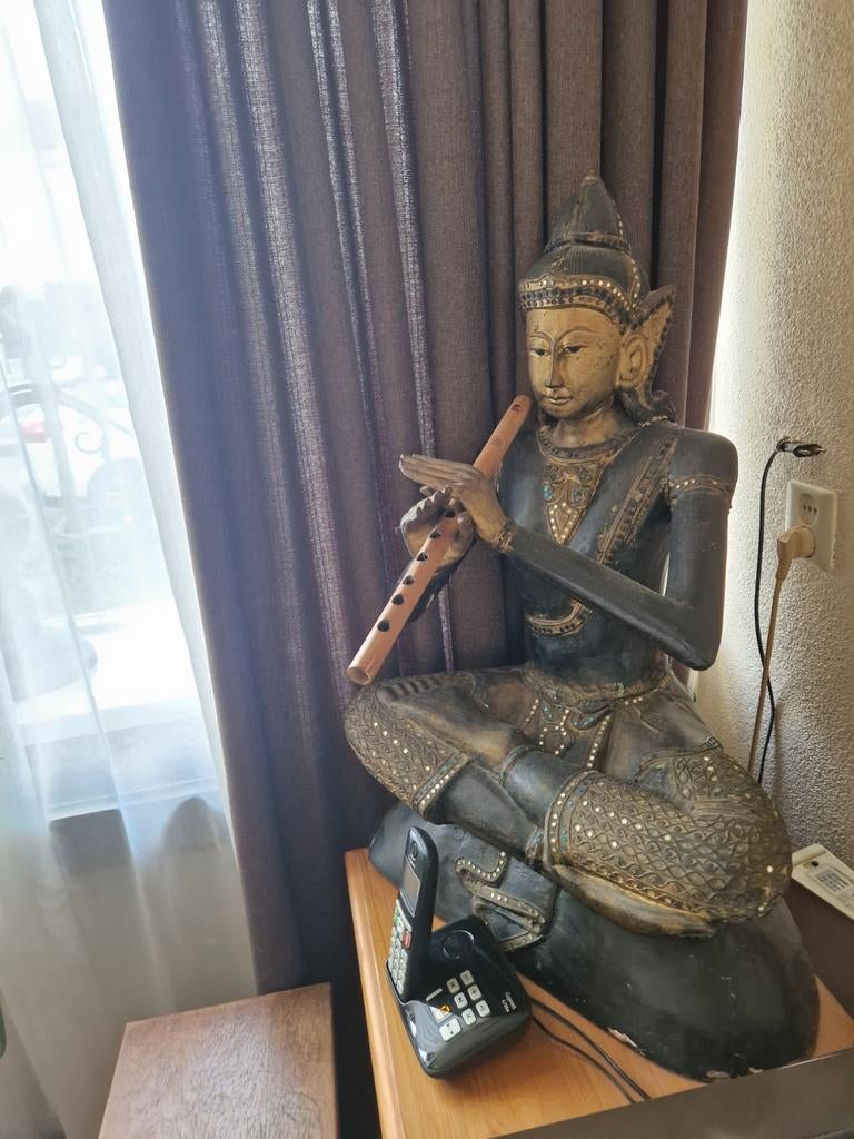 Houten Boeddha beeld met fluit, Ophalen