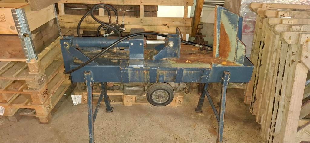 Houtklover hydraulisch, Ophalen