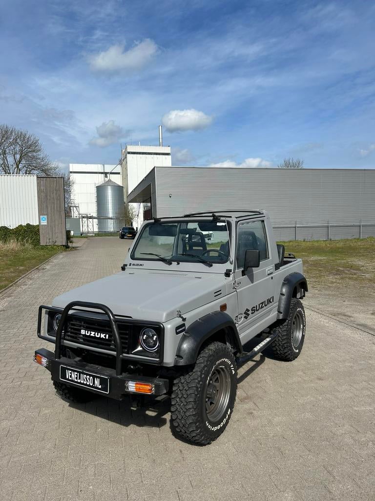 Suzuki Samurai SJ413 4x4 – Uniek & perfecte Staat (1987), Auto's, Suzuki, 4 cilinders, Cabriolet, Samurai, Bruin