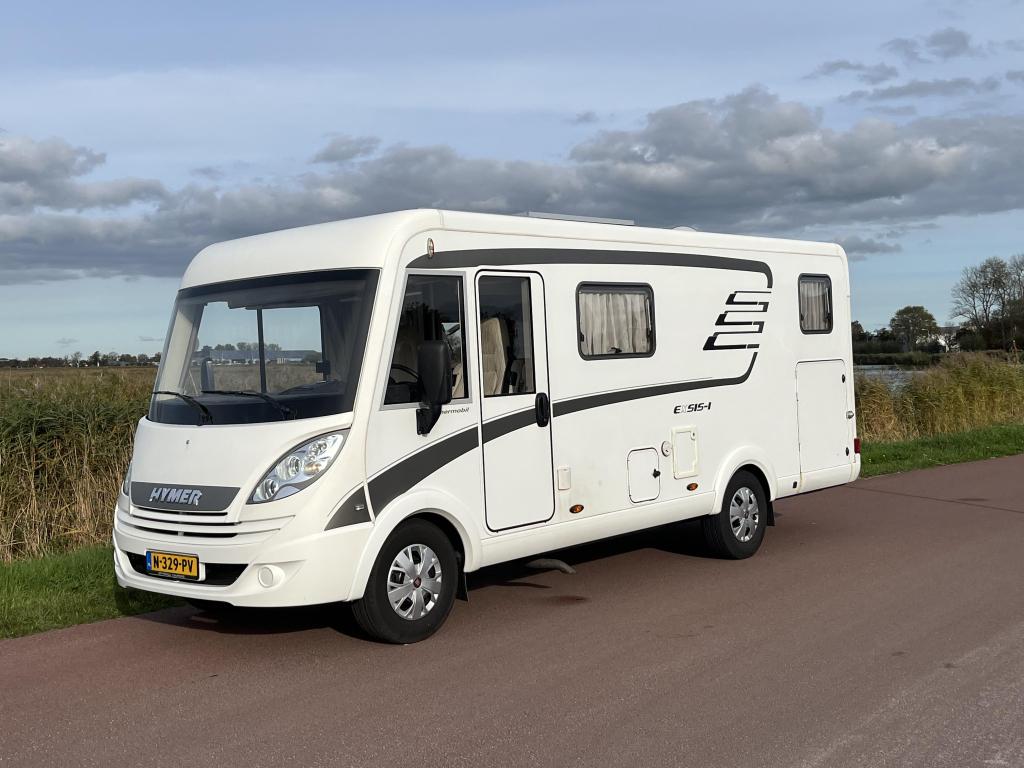 Hymer Exsis 578 Lengtebedden hefbed 675cm, Caravans en Kamperen, Integraal, Chemisch toilet, Achteruitrijcamera, Ringverwarming