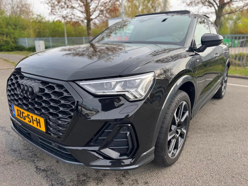 Audi Q3 Sportback 45 TFSI e S Edition SONOS Pano Camera Trek, Auto's, Adaptive Cruise Control, Gebruikt, Zwart, Hybride Elektrisch/Benzine
