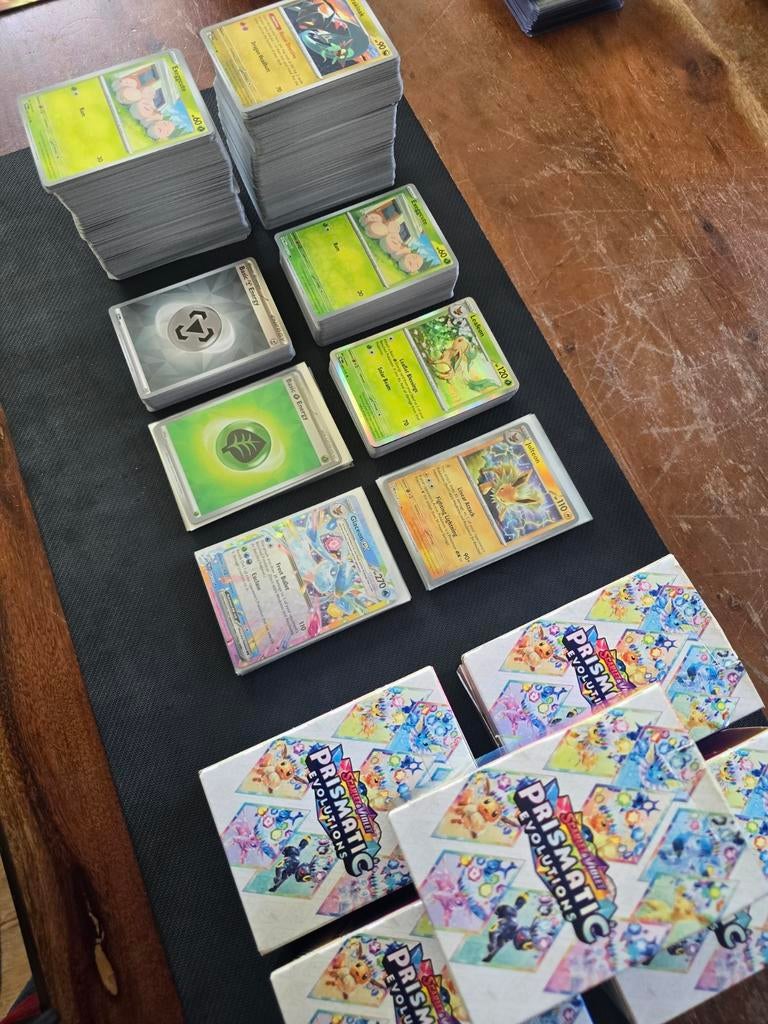 Prismatic Evolutions bulk, Ophalen of Verzenden, Zo goed als nieuw, Meerdere kaarten