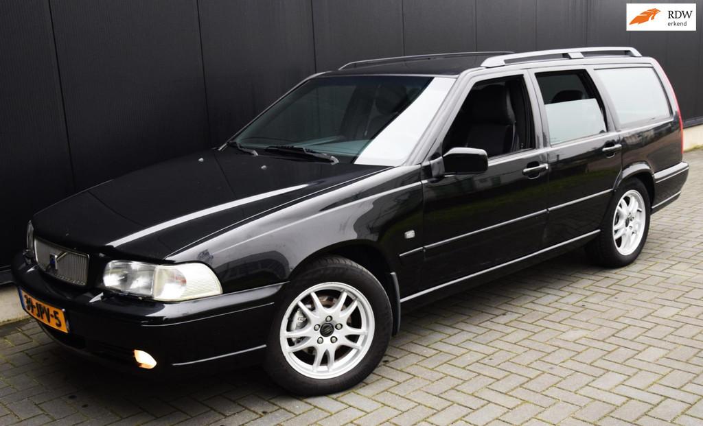 Volvo V70 2.4 Polar Lpg G3 140 pk, Auto's, Volvo, Voorwielaandrijving, Gebruikt, Zwart, Leder en Stof