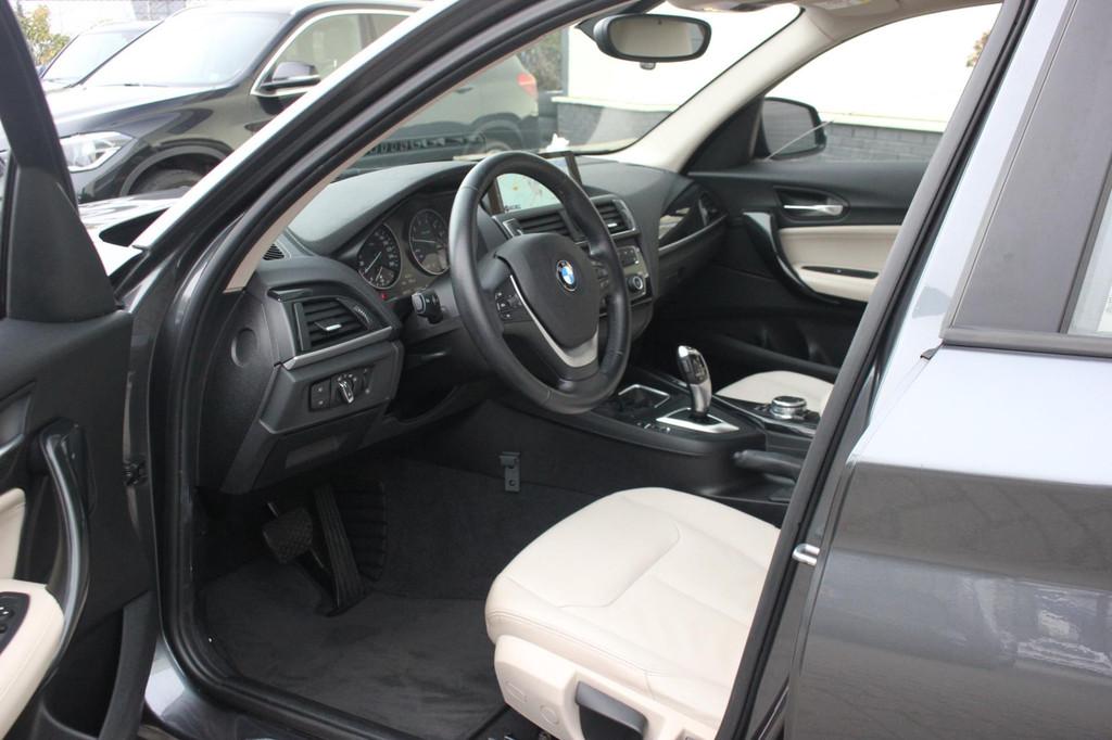BMW 1-serie 118i Centennial High Executive | Leer | Camera |, Auto's, BMW, Gebruikt, 650 kg, 3 cilinders, 1300 kg