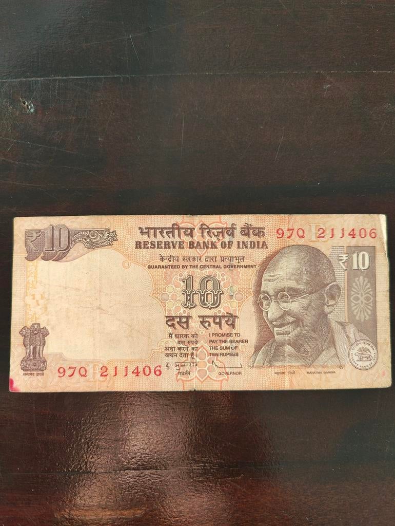 Indiase 10 roepie bankbiljet met Mahatma Gandhi, Postzegels en Munten, Ophalen of Verzenden