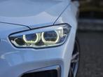 BMW 1-serie M135i xDrive |OPENDAK|H&K|STUUR/STOELVERW, Gebruikt, Zwart, Met garantie (alle), Wit