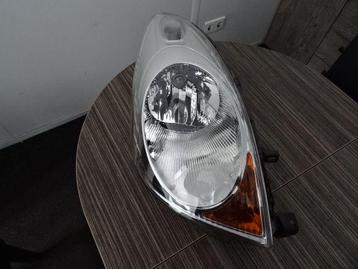 Koplamp 89902135 Nissan Note bj 2009 links perfecte staat. beschikbaar voor biedingen
