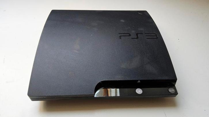 PS 3 met 2 afstandsbedieningen, een luchtgitaar en 10 spelen, Spelcomputers en Games, Spelcomputers | Sony PlayStation 3, Zo goed als nieuw