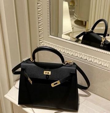 Hermes Kelly zwart en wit beschikbaar voor biedingen