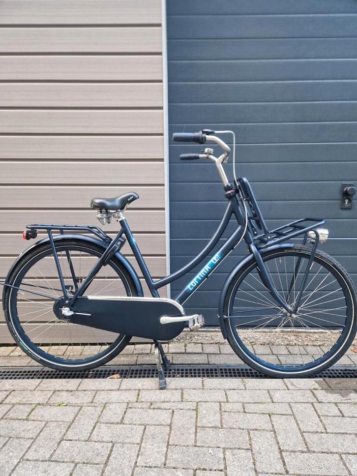 Cortina U4 damesfiets/transportfiets 28 inch donkerblauw, Fietsen en Brommers, Fietsen | Dames | Moederfietsen, Zo goed als nieuw