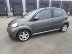 Toyota Aygo 1.0-12V Aspiration Green / Airco / 5 Drs / Navig, Auto's, Voorwielaandrijving, Gebruikt, Zwart, 4 stoelen