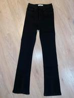 Zwarte flare jeans met split maat 34 nieuwstaat, Kleding | Dames, Broeken en Pantalons, Ophalen, Zwart, Zo goed als nieuw, Maat 34 (XS) of kleiner