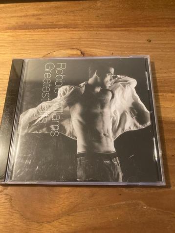 Robbie Williams - Greatest hits beschikbaar voor biedingen