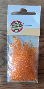 Te koop: Kraaltjes rocailles transparant oranje., Ophalen of Verzenden, Nieuw, Overige thema's, Pons of Mal