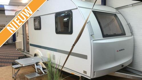 Adria Aviva 492 LU nu 1000,00 euro korting, Caravans en Kamperen, Caravans, tot en met 4, 1000 - 1250 kg, Treinzit, Adria, 2 aparte bedden
