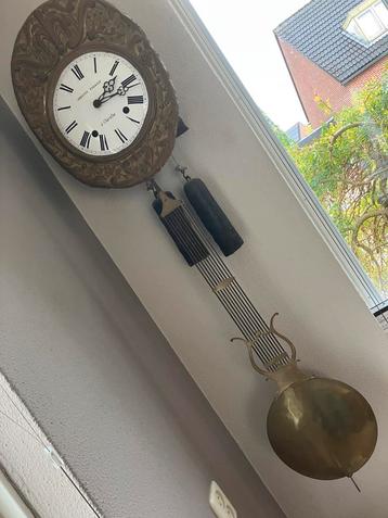 Comtoise Klok + Boekje beschikbaar voor biedingen