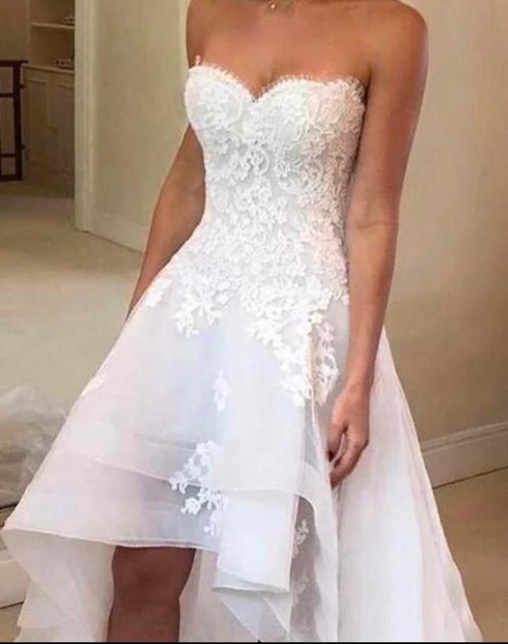 Nieuwe trouwjurk kort lang €749 34 36 38 40 42 44, Kleding | Dames, Trouwkleding en Trouwaccessoires, Nieuw, Trouwjurk, Wit, Ophalen