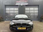 BMW 1-serie 116i High Executive Sport, Auto's, Gebruikt, 4 cilinders, Zwart, Leder