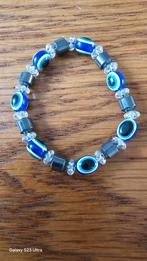 Elastische armband blauw 'boze oog', Ophalen of Verzenden