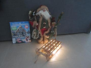 kerstman vrij groot,  met houten slee beschikbaar voor biedingen