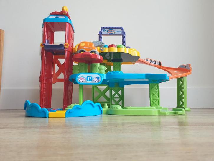 Toet toet V-tech parkeergarage en autos, Kinderen en Baby's, Speelgoed | Vtech, Gebruikt, 2 tot 4 jaar, Ophalen of Verzenden