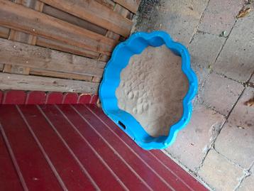 Te Koop zandbak met een scheurtje beschikbaar voor biedingen