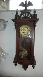 Antieke klok met Adelaar, Ophalen