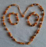 Gehaakte ketting met bijpassende armbandjes, Ophalen of Verzenden, Nieuw, Overige materialen