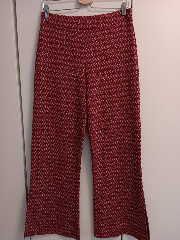 Benetton lange rode broek met print mt.L, Kleding | Dames, Broeken en Pantalons, Zo goed als nieuw, Maat 42/44 (L), Rood, Lang