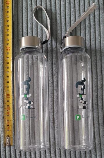 2 waterflessen 0,5L, doorzichtig met koord en RVS dop beschikbaar voor biedingen