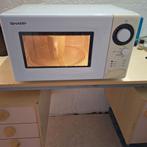 Sharp magnetron (bezorging), Ophalen, Zo goed als nieuw