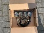 Synchroon meter carburateur, Ophalen