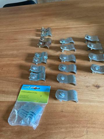 10 sets met daksteunklem of verandabuis beschikbaar voor biedingen