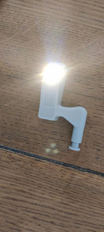 Verlichting bij deuropening beschikbaar voor biedingen
