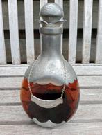Karaf : glas en tin, Ophalen