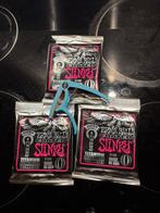 Roze Ernie Ball Super Slinky Gitaar Snaren + capo