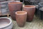 Grote hoge ronde zware bloempotten cement 3 maten terras