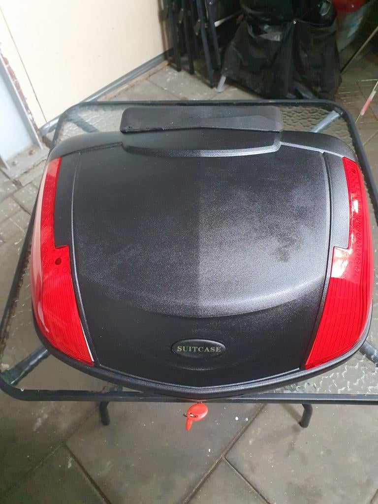 Motor/scooter koffer, Ophalen