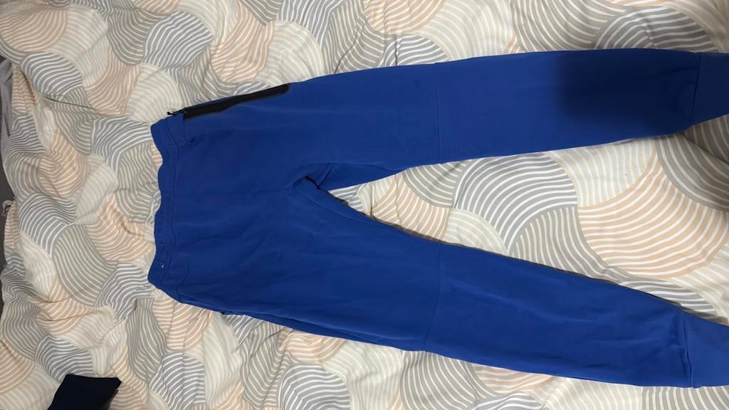 Nike tech broek, Ophalen of Verzenden, Gedragen, Maat 48/50 (M), Blauw