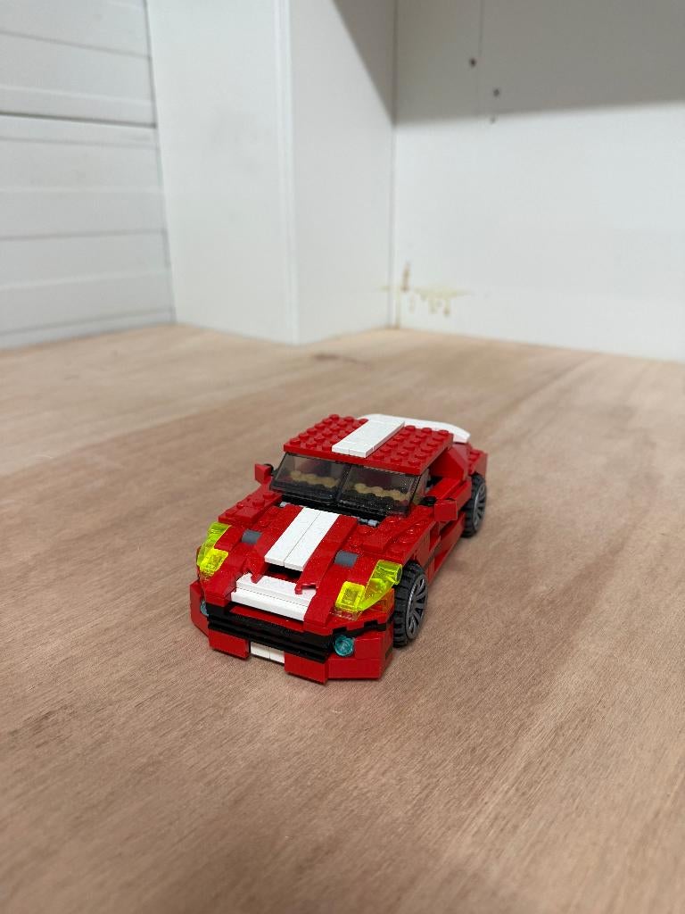 LEGO Rood Witte Sportauto (Machtige Motoren), Lego, Community@lego.com, Ophalen of Verzenden, Zo goed als nieuw